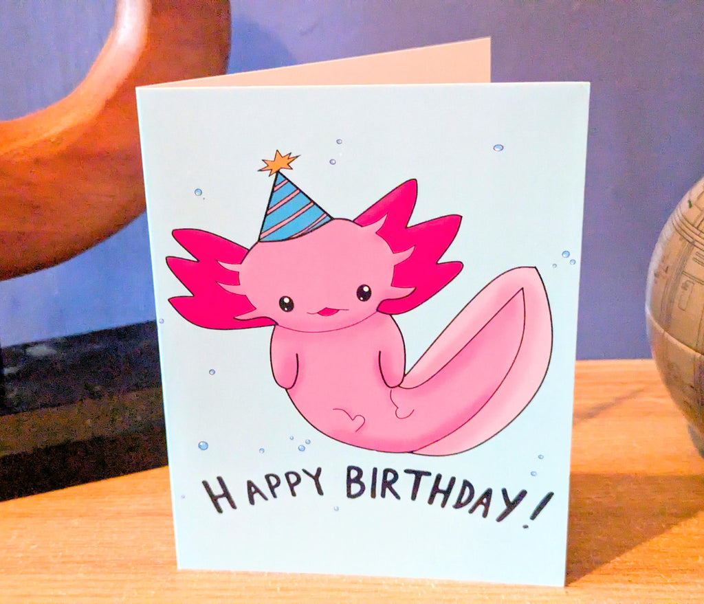 Cute Pink Axolotyl wearing a party hat Birthday, Greetings Cards, Happy Birthday, funny pun.